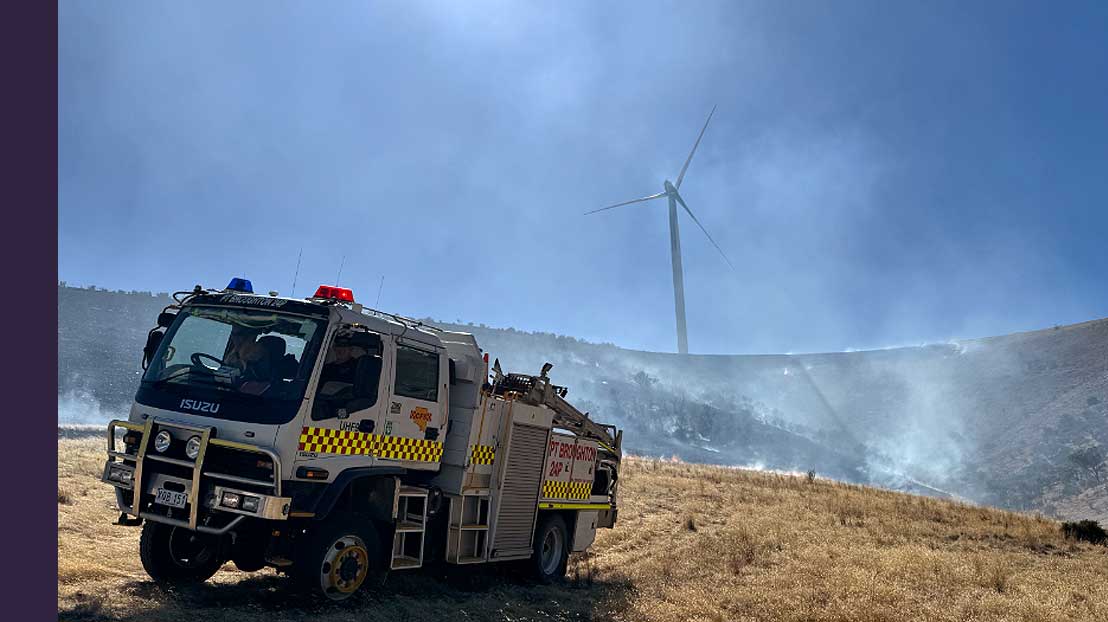 Rural fire brigade trucks are no contest for a fire atop a massive tower.