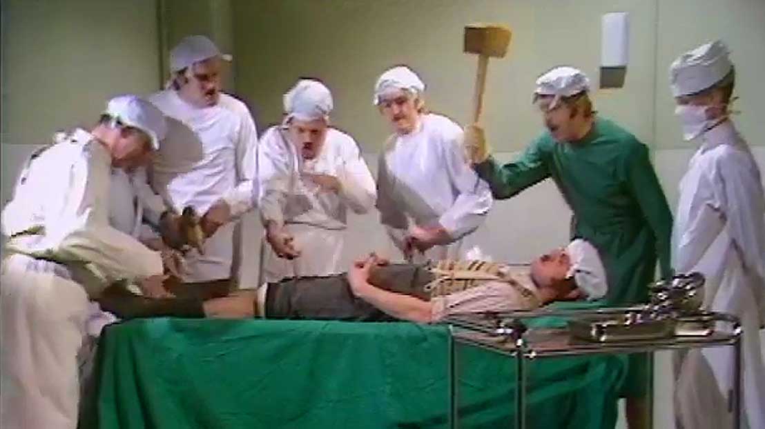 Monty Python performing ridiculous surgery