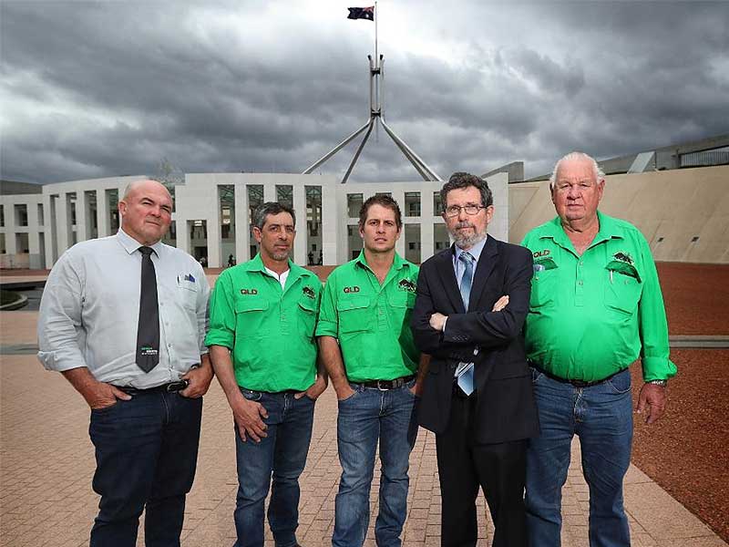 Green Shirts members in front of parliament house Canberra.